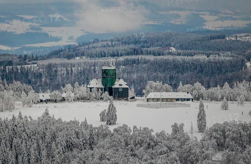 Aerial view of the snowy winter landscape of Winterberg am Kahlen Asten with Astenturm in times of Corona in Sauerland in North Rhine-Westphalia, Germany, Sauerland, Europe, aerial photo, birds-eyes view, aerial photography, aerial photography, overview, bird's eye view, lockdown, closed winter landscape, corona lockdown, deserted, snow, winter weather, corona-related lockdown