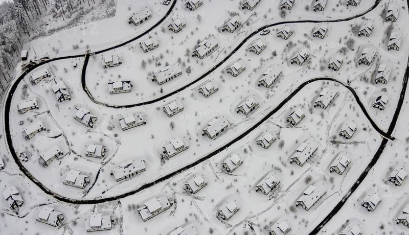 Aerial view of the snowy winter landscape of Winterberg with the deserted Landal Winterberg holiday resort in the Corona Lockdown in Sauerland in North Rhine-Westphalia, Germany, Sauerland, Europe, aerial photo, birds-eyes view, aerial photography, aerial photography, overview, bird's eye view, lockdown, closed winter landscape, corona lockdown, deserted, snow, winter weather, corona-related lockdown