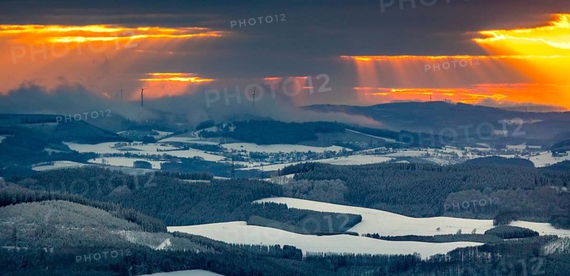 Aerial view of the sunset with a view over the snowy winter landscape from Winterberg to the Bergisches Land in Sauerland in North Rhine-Westphalia, Germany, Sauerland, Europe, aerial view, birds-eyes view, aerial photography, aerial photography, overview, bird's eye view, lockdown, closed winter landscape, corona lockdown, deserted, snow, winter weather, corona-related lockdown