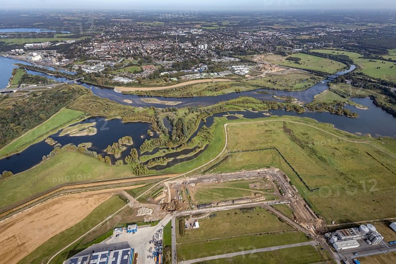 Aerial view, renaturalisation of the Lippe estuary between Lippeschlösschen and Rhine bridge and Rhine river as well as Rhine-Lippe harbour and construction site of the southern bypass in Wesel, Lower Rhine, North Rhine-Westphalia, Germany, construction work, construction area, construction site, building plots, construction project, construction site, DE, Europe, Lippe floodplain, Lippeverband, aerial view, aerial photography, aerial photography, new construction, overview, redesign of the Lippe estuary, bird's eye view, Wesel, birds-eyes view, overview