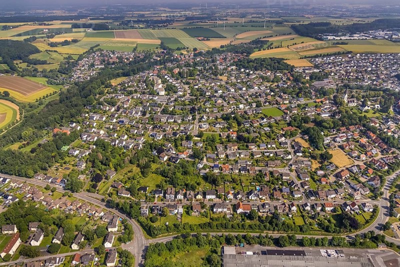 Aerial view, local view and high-rise buildings on Antoniusstraße and Eichenstraße in Wickede, Sauerland, North Rhine-Westphalia, Germany, DE, Europe, property tax, high-rise building, high-rise buildings, real estate, aerial view, aerial photography, aerial photography, apartment buildings, apartment blocks, overview, bird's-eye view, Wickede, residential area, housing and living, residential area, residential buildings, quality of living, housing estate, birds-eyes view, overview