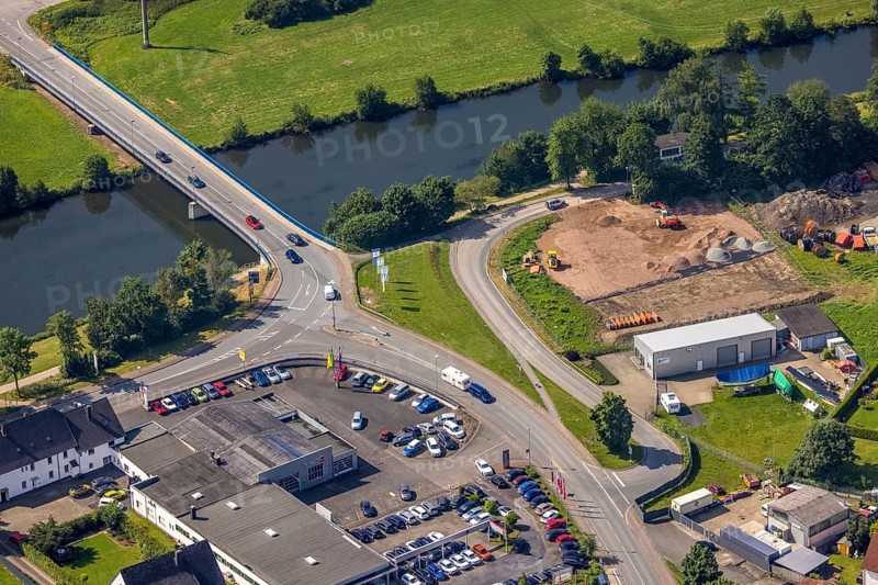 Aerial view, Ruhr bridge federal road 63 over the river Ruhr, construction site on the banks of the Ruhr, Wickede, Sauerland, North Rhine-Westphalia, Germany, construction area, construction site, building plots, construction site, bridge, DE, Europe, aerial view, aerial photography, aerial photography, Ruhr bridge, road traffic, overview, traffic volume, bird's eye view, birds-eyes view, overview
