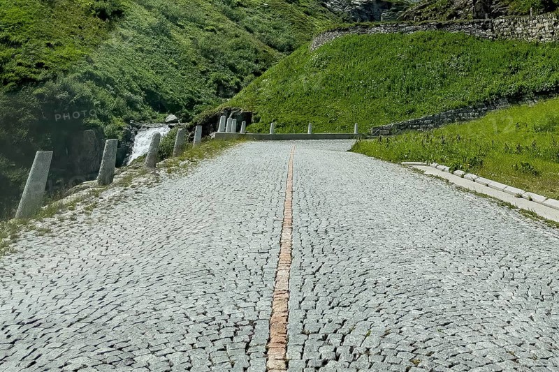 Part of the southern ascent of the south ramp of the historic Gotthard pass road Tremola with cobblestones, Canton Ticino Ticino, Switzerland