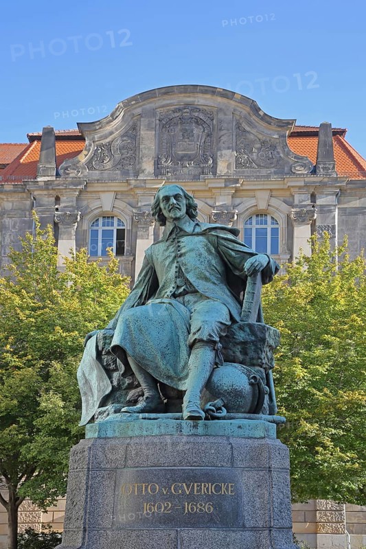 Otto von Guericke Fountain and monument to physicist Otto von Guericke, inscription, sculpture, New Town Hall, view from below, Hauptwache, Magdeburg, Saxony-Anhalt, Germany