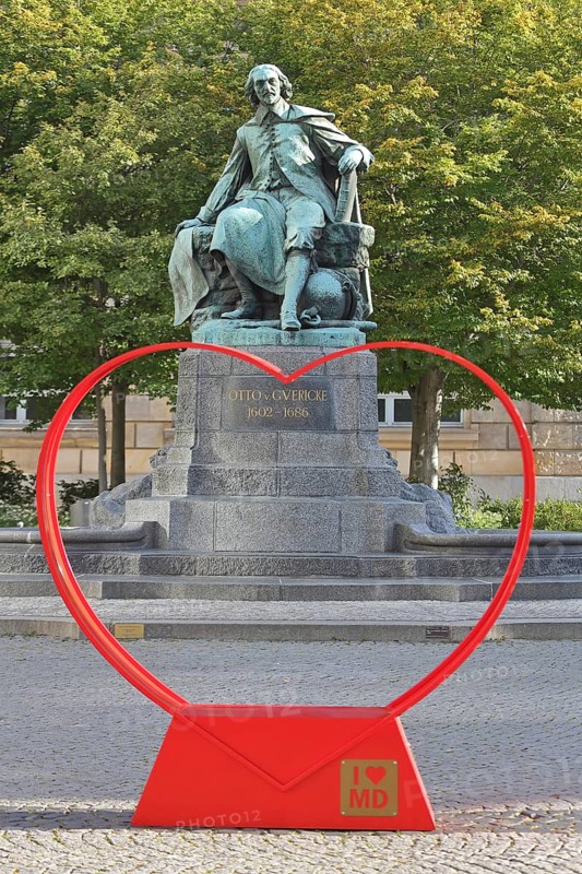Red heart with I like MD and Otto von Guericke Fountain, monument, sculpture, inscription, view, through, heart-shaped, letter, sign, symbol for love, solidarity, love, perspective, abbreviation, letters, New Town Hall, Hauptwache, Magdeburg, Saxony-Anhalt, Germany