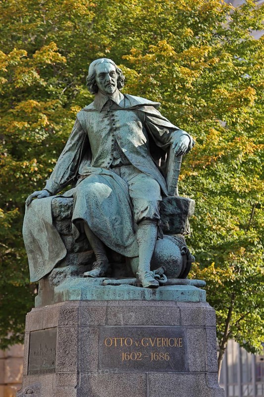 Otto von Guericke Fountain and monument to physicist Otto von Guericke, sculpture, inscription, Hauptwache, Magdeburg, Saxony-Anhalt, Germany