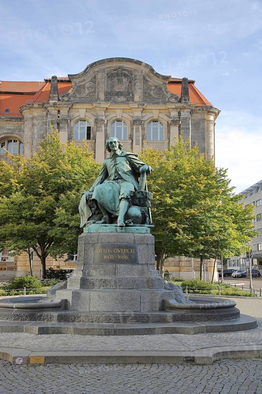 Otto von Guericke Fountain and monument to physicist Otto von Guericke, inscription, sculpture, New Town Hall, view from below, Hauptwache, Magdeburg, Saxony-Anhalt, Germany