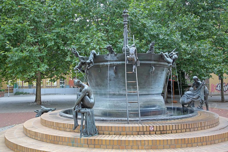 Faun Fountain by Heinrich Apel 1986, modern art, bronze sculptures, figures, rung ladder, high, climb, climbing, sculpture group, cauldron, water basin, large sculpture, Devil's Fountain, Magdeburg, Saxony-Anhalt, Germany