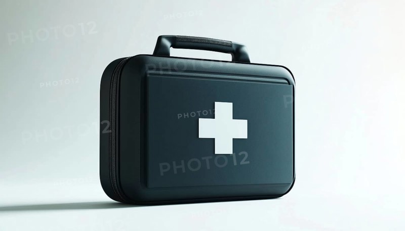 Black First Aid Kit On A White Background Symbolizing The Necessity Of Having A First Aid Kit. Iconic Representation Of Safety, AI generated