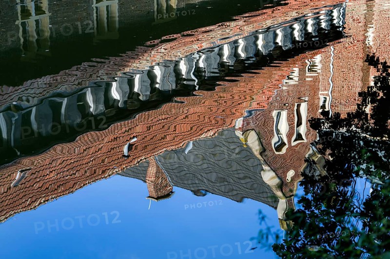 Water reflection, Senden Castle, Senden, North Rhine-Westphalia, Germany