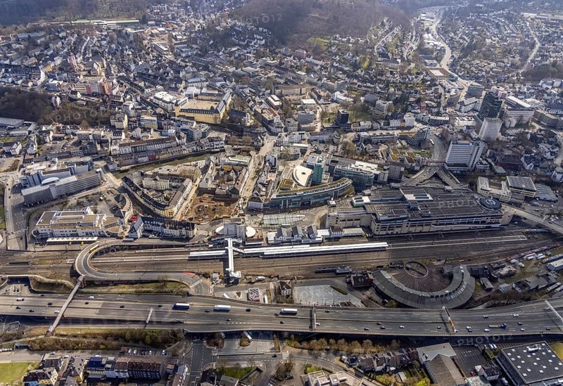 Aerial view, Siegen main station with ZOB bus station, roundhouse, City-Galerie, Sieg-Carré, Siegen-Kernband, Siegen, Siegerland, North Rhine-Westphalia, Germany, railway tracks, railway station, DE, Deutsche Bahn AG, shopping centre, shopping mall, shopping place, shopping centre, Europe, railway tracks, main station, central station, aerial view, aerial photography, aerial photography, shopping, shopping, shopping centre, overview, bird's eye view, birds-eyes view, overview