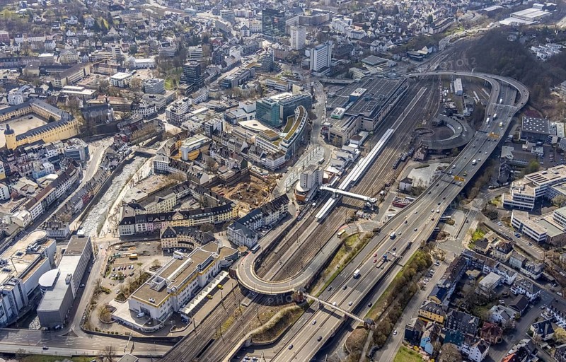 Aerial view, Siegen main station with ZOB bus station, roundhouse, City-Galerie, Sieg-Carré, Siegen-Kernband, Siegen, Siegerland, North Rhine-Westphalia, Germany, railway tracks, railway station, DE, Deutsche Bahn AG, shopping centre, shopping mall, shopping place, shopping centre, Europe, railway tracks, main station, central station, aerial view, aerial photography, aerial photography, shopping, shopping, shopping centre, overview, bird's eye view, birds-eyes view, overview