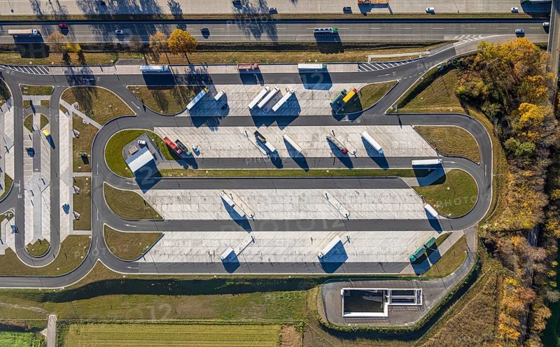 Aerial view, motorway A44 service area Am Haarstrang with truck parking Haarstrand -Süd in the district Westbüderich in Werl, Soester Börde, North Rhine-Westphalia, Germany, motorway A44, motorway service area, motorway service area, DE, Europe, truck parking, aerial view, aerial photography, aerial photography, parking, service area, overview, bird's eye view, Werl, birds-eyes view, overview