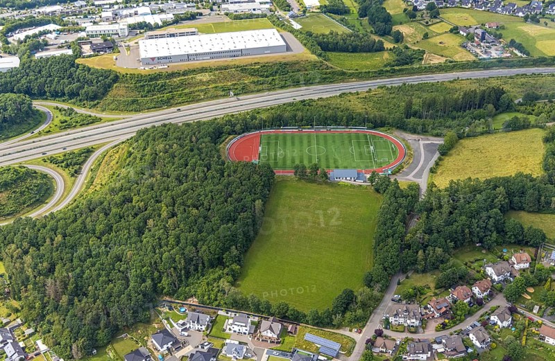 Aerial view, sports ground FSV Gerlingen e.V., Gerlingen, Wenden, Sauerland, North Rhine-Westphalia, Germany, DE, Europe, football pitch, football stadium, commercial enterprises, commercial area, commercial site, commercial use, industrial area, industrial site, athletics stadium, aerial photograph, aerial photography, aerial photography, Schell GmbH Sanitärtechnik, sport, sports facilities, sports ground, sports facility, overview, bird's-eye view, bird's-eye view, overview