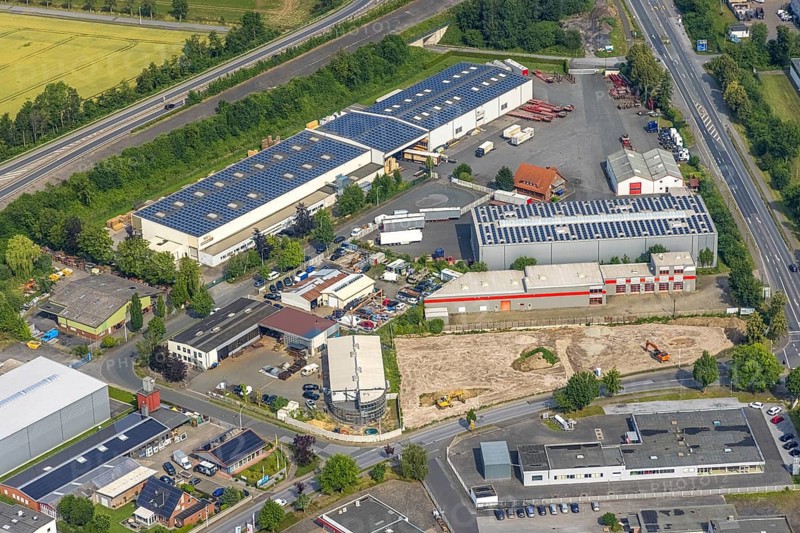 Aerial view, commercial area Hammer Straße, HolzTec GmbH with solar roof, Budberg, Werl, Soester Börde, North Rhine-Westphalia, Germany, DE, Europe, commercial enterprises, commercial area, commercial park, commercial location, commercial use, industrial area, industrial building, industrial location, aerial photograph, aerial photography, aerial photography, photovoltaic, photovoltaic system, solar, solar system, solar roof, solar energy, solar energy, overview, bird's eye view, birds-eyes view, overview