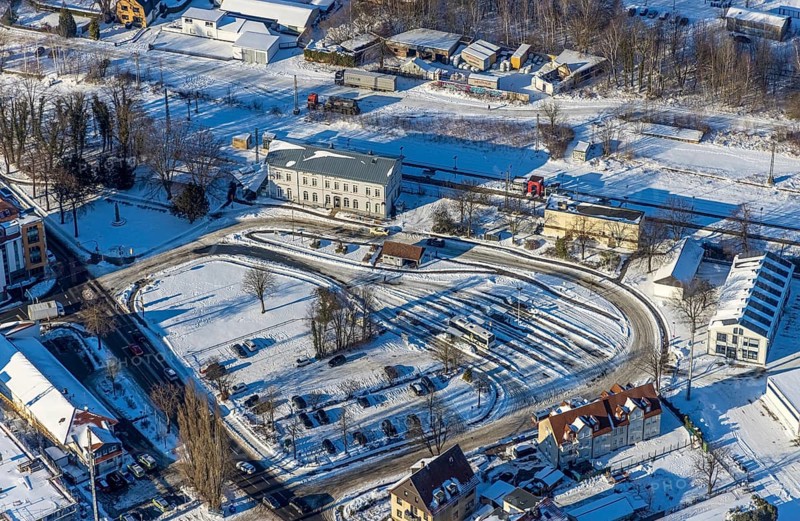 Aerial view, railway station, railway tracks, bus station, winter, snow, Werl, Soester Börde, North Rhine-Westphalia, Germany, Soester, Börde, DE, Europe, birds-eyes, view, aerial view, aerial photography, aerial photography, overview, overview, bird's eye view, train traffic, railway traffic, transport connection, travel, holiday, railway line, railway network, infrastructure, transport, freight traffic, railway network