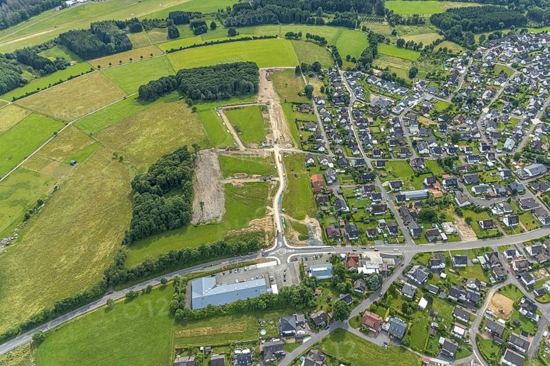 Aerial view, construction site, new development area An der Wahre, for residential buildings, Siegener Straße, Hünsborn, Wenden, Sauerland, North Rhine-Westphalia, Germany, construction work, construction area, building site, building plots, construction project, construction site, DE, Europe, aerial view, aerial photography, aerial photography, overview, bird's-eye view, overview