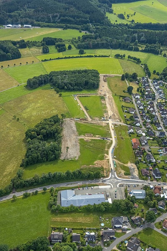 Aerial view, construction site, new development area An der Wahre, for residential buildings, Siegener Straße, Hünsborn, Wenden, Sauerland, North Rhine-Westphalia, Germany, construction work, construction area, building site, building plots, construction project, construction site, DE, Europe, aerial view, aerial photography, aerial photography, overview, bird's-eye view, overview