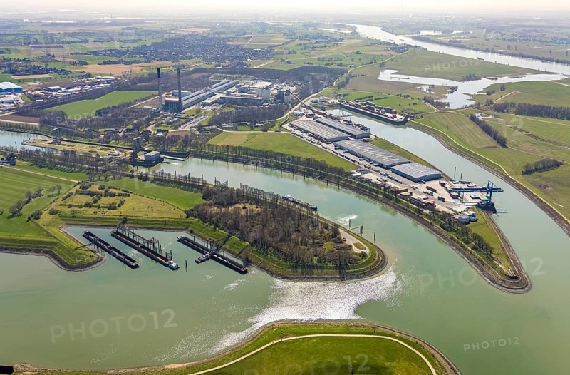 Aerial view, harbour Emmelsum, lock Friedrichsfeld, lock road, river Rhine, Rhine estuary Wesel-Datteln canal, Emmelsum, Voerde, Ruhr area, Lower Rhine, North Rhine-Westphalia, Germany, inland navigation, view to Büderich, DE, Europe, distant view, river, goods transport, goods traffic, harbour basin, canal, logistics, aerial view, aerial photography, aerial photography, estuary, ship, shipping pier, shipping traffic, lock, overview, bird's eye view, birds-eyes view, overview