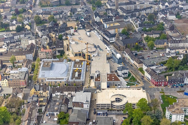 Aerial view, construction site at Forum Niederberg, cultural and event centre, StadtGalerie Velbert, St. Marien Kirche, Velbert, Ruhr area, North Rhine-Westphalia, Germany, place of worship, construction work, construction area, building site, building plots, construction crane, construction project, construction site, DE, shopping centre, shopping square, shopping mall, Europe, religious community, place of worship, holy place, church, parish, denomination, convention centre, culture, art, aerial view, aerial photography, aerial photography, religion, religious site, shopping, shopping centre, overview, events, venue, event location, event centre, bird's-eye view, birds-eyes view, cultural use, overview