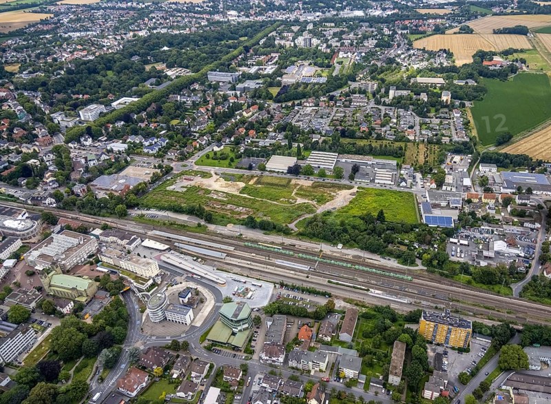 Aerial view, Unna railway station, Viktoriastrasse construction area for office building, Unna, Ruhr area, North Rhine-Westphalia, Germany, railway tracks, railway station, station forecourt, construction work, construction area, construction site, building plots, construction project, construction site, DE, Deutsche Bahn AG, Europe, main station, main station, Kantstrasse, junction station, aerial view, aerial photography, aerial photography, postal stairs, overview, bird's eye view, bird's eye view, overview