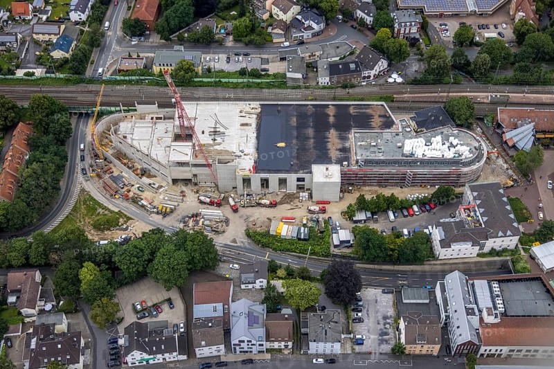 Aerial view, construction site and new building shopping centre, formerly Mühle Bremme site, Unna, Ruhr area, North Rhine-Westphalia, Germany, construction work, construction area, construction site, building plots, construction measure, construction project, construction site, DE, shopping centre, Europe, Kantstraße, aerial view, aerial photography, aerial photography, new building, postal stairs, overview, bird's eye view, overview