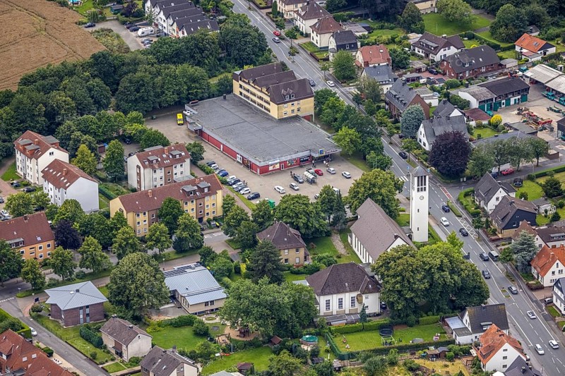 Aerial view, Edeka supermarket, Friedenskirche Maßen, Maßen, Unna, Ruhr area, North Rhine-Westphalia, Germany, place of worship, DE, shopping place, shopping centre, Europe, religious community, place of worship, holy place, church, parish, denomination, aerial view, aerial photography, aerial photography, local supply centre, religion, religious site, supermarket, overview, bird's-eye view, overview
