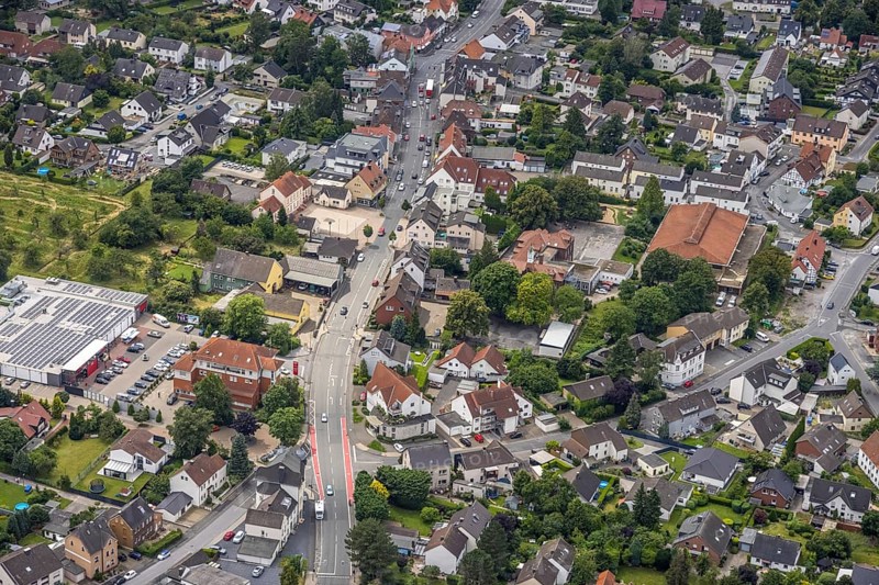 Aerial view, Rewe supermarket with solar roof, Massener Hellweg, primary school Schillerschule, Maßen, Unna, Ruhr area, North Rhine-Westphalia, Germany, education, educational institution, DE, shopping markets, shopping square, shopping centre, Europe, primary school, educational institute, aerial view, aerial photography, aerial photography, local supply centre, photovoltaics, photovoltaic system, school, solar, solar system, solar roof, solar energy, solar energy, overview, bird's eye view, birds-eyes view, overview