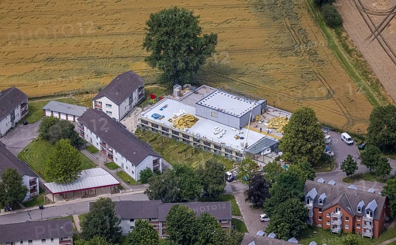 Aerial view, Buderuskolonie, Campus Unna Hochschulcampus, construction site at Lippestraße, Maßen, Unna, Ruhr area, North Rhine-Westphalia, Germany, construction work, construction area, building site, building plots, construction measure, construction project, building site, education, educational institution, DE, Europe, university, university of applied management, teaching institute, aerial view, aerial photography, aerial photography, new building, overview, bird's eye view, overview