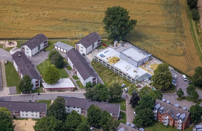 Aerial view, Buderuskolonie, Campus Unna Hochschulcampus, construction site at Lippestraße, Maßen, Unna, Ruhr area, North Rhine-Westphalia, Germany, construction work, construction area, building site, building plots, construction measure, construction project, building site, education, educational institution, DE, Europe, university, university of applied management, teaching institute, aerial view, aerial photography, aerial photography, new building, overview, bird's eye view, overview