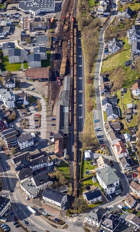 Aerial view, timber transport and loading at Sundern station, Sundern, Sauerland, North Rhine-Westphalia, Germany, railway tracks, railway station, DE, Deutsche Bahn AG, Europe, freight, freight transport, freight traffic, main station, aerial view, aerial photography, aerial photography, overview, bird's-eye view, overview