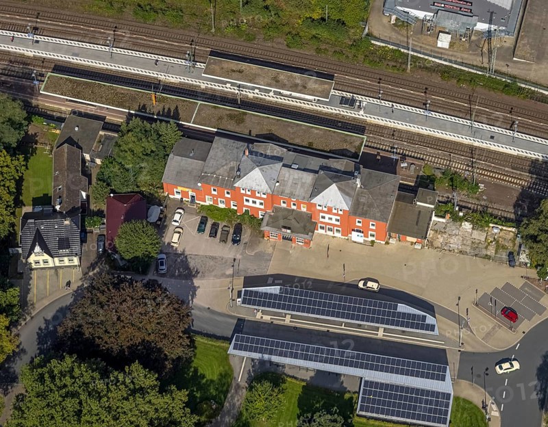 Aerial view, Schwelm railway station with red station building and bus station with solar roof in Schwelm, Ruhr area, North Rhine-Westphalia, Germany, railway station, station forecourt, bus station, DE, Deutsche Bahn AG, Europe, central station, main station, aerial view, aerial photography, aerial photography, Schwelm, overview, bird's-eye view, ZOB, birds-eyes view, overview