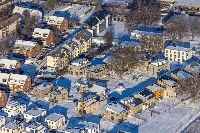 Aerial view, Belgian Quarter Soest, new construction of flats and terraced houses, former Belgian barracks BEM Adam, snow, winter, Jakobi, Soest, Soester Börde, North Rhine-Westphalia, Germany, Soester, Börde, DE, Europe, birds-eyes, view, aerial photography, aerial photography, aerial photography, overview, overview, bird's eye view, winter weather, winter onset, cold, residential neighbourhood, former, barracks, housing, flat, houses, residential buildings, housing estate, settlement