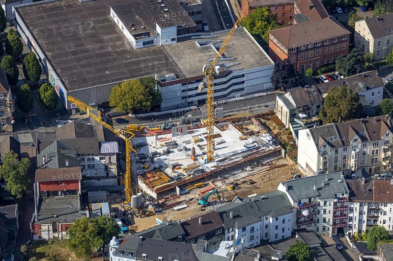 Aerial view, construction site and new building between Neumarkt and Schulstraße in Schwelm, Ruhr area, North Rhine-Westphalia, Germany, construction work, construction area, construction site, building plots, construction crane, construction project, construction site, DE, Europe, aerial view, aerial photography, aerial photography, new building, Schwelm, overview, bird's-eye view, overview