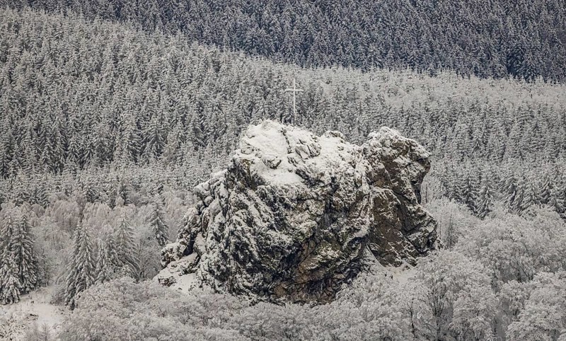 Aerial view of the rock formation Bruchhauser Steine a ground monument with four main rocks on the Istenberg in the Rothaargebirge in winter with snow in Bruchhausen in Olsberg in Sauerland in North Rhine-Westphalia, Germany, Sauerland, Europe, aerial view, birds-eyes view, aerial photography, aerial photography, overview, bird's eye view