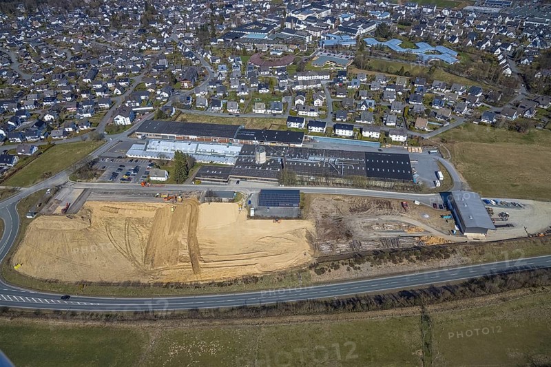 Aerial view, construction site at Körling GmbH, Hans-Körling-Straße, Bigge, Olsberg, Sauerland, North Rhine-Westphalia, Germany, construction area, construction site, building plots, construction project, construction site, DE, Europe, commercial enterprises, commercial area, commercial use, industrial area, industrial site, aerial photograph, aerial photography, aerial photography, overview, bird's-eye view, bird's-eye view, overview