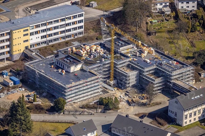 Aerial photo, construction site at the Berufskolleg Olsberg des HSK, Olsberg, Sauerland, North Rhine-Westphalia, Germany, construction work, construction area, construction site, construction project, construction site, education, educational institution, DE, Europe, college school, teaching institute, aerial photo, aerial photography, aerial photography, school, overview, bird's-eye view, bird's-eye view, overview