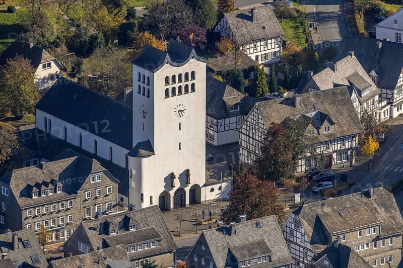 Aerial view, catholic parish church St. Georg in the district Fredeburg in Schmallenberg, Sauerland, North Rhine-Westphalia, Germany, place of worship, DE, Europe, half-timbered houses, religious community, place of worship, holy place, church, parish, denomination, aerial view, aerial photography, aerial photography, religion, religious site, Schmallenberg, overview, bird's-eye view, birds-eyes view, overview
