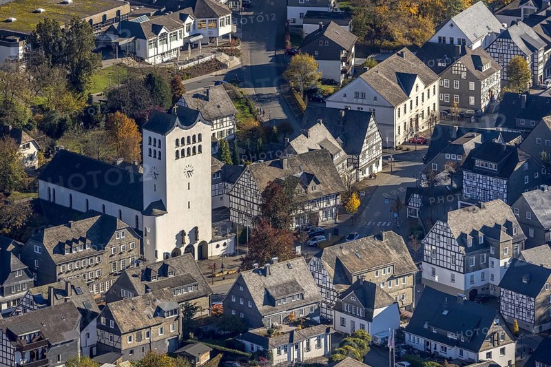 Aerial view, catholic parish church St. Georg in the district Fredeburg in Schmallenberg, Sauerland, North Rhine-Westphalia, Germany, place of worship, DE, Europe, half-timbered houses, religious community, place of worship, holy place, church, parish, denomination, aerial view, aerial photography, aerial photography, religion, religious site, Schmallenberg, overview, bird's-eye view, birds-eyes view, overview