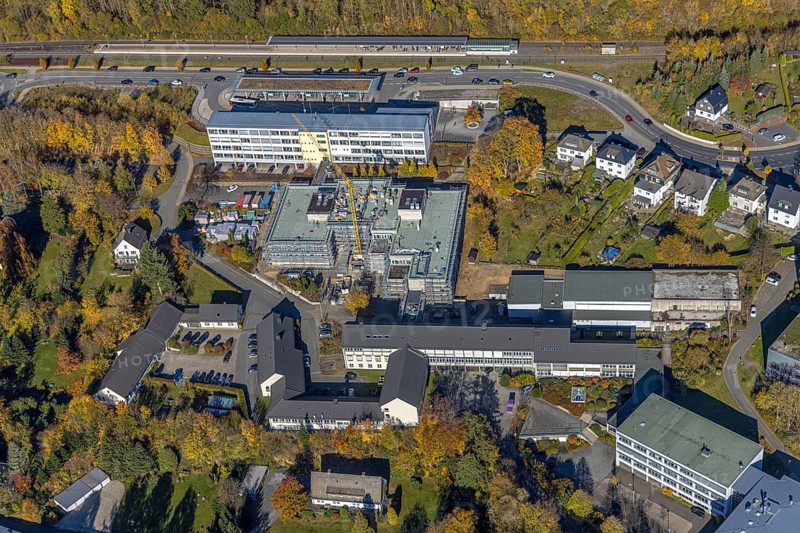 Aerial view, bus station and construction work at the vocational college Olsberg of the HSK in Olsberg, Sauerland, North Rhine-Westphalia, Germany, construction work, construction project, construction site, vocational college, vocational school, education, educational institution, bus station, bus stop, DE, Europe, educational institute, aerial view, aerial photography, aerial photography, Olsberg, bus station, school, overview, bird's eye view, ZOB, birds-eyes view, overview