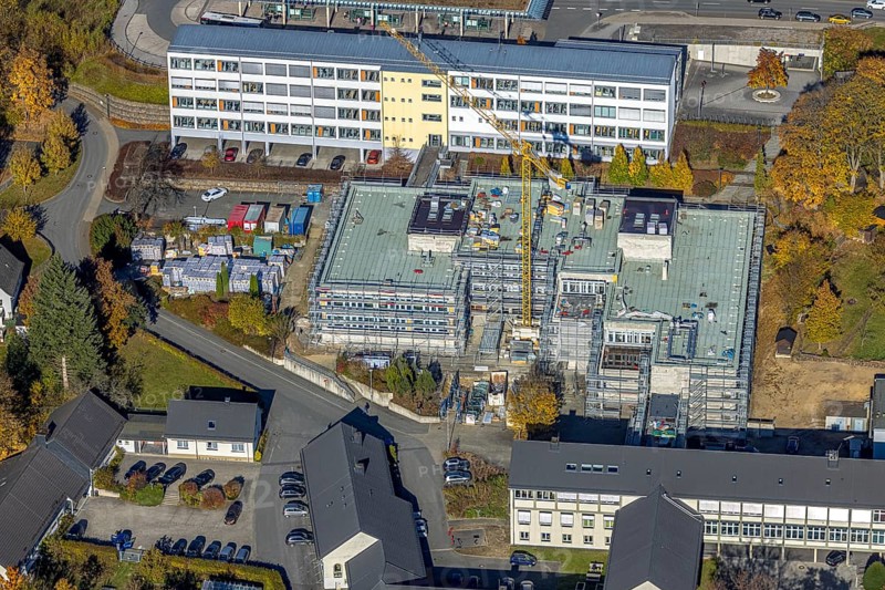 Aerial view, bus station and construction work at the vocational college Olsberg of the HSK in Olsberg, Sauerland, North Rhine-Westphalia, Germany, construction work, construction project, construction site, vocational college, vocational school, education, educational institution, bus station, bus stop, DE, Europe, educational institute, aerial view, aerial photography, aerial photography, Olsberg, bus station, school, overview, bird's eye view, ZOB, birds-eyes view, overview