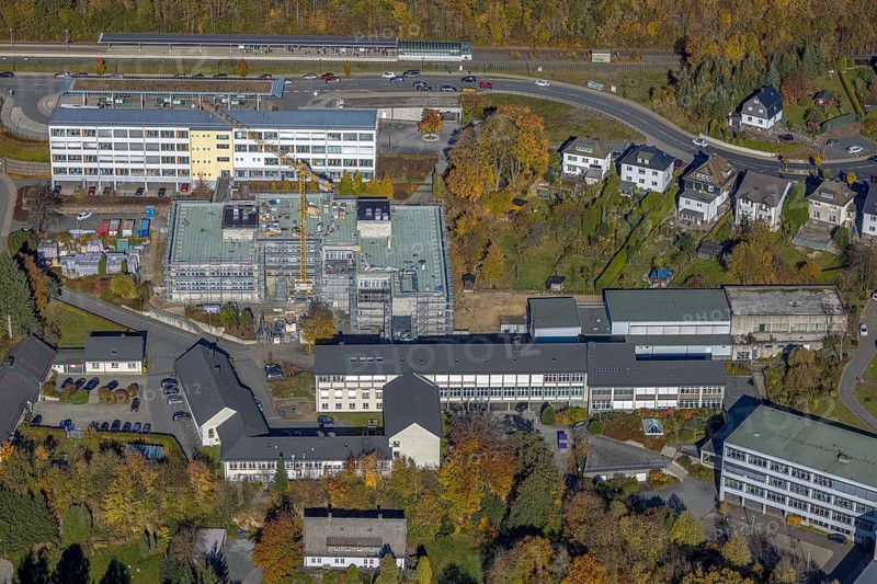Aerial view, bus station and construction work at the vocational college Olsberg of the HSK in Olsberg, Sauerland, North Rhine-Westphalia, Germany, construction work, construction project, construction site, vocational college, vocational school, education, educational institution, bus station, bus stop, DE, Europe, educational institute, aerial view, aerial photography, aerial photography, Olsberg, bus station, school, overview, bird's eye view, ZOB, birds-eyes view, overview