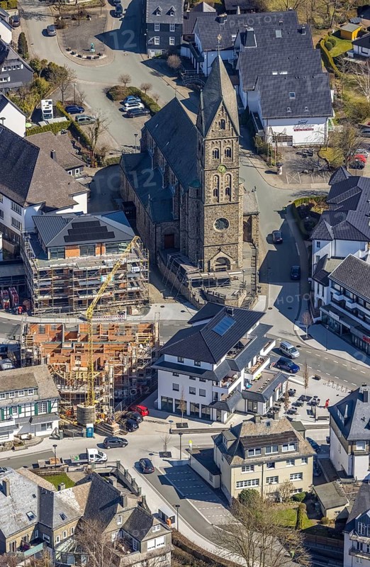 Aerial view, Construction site, New residential and commercial building Bahnhofstraße at the catholic parish church St. Nikolaus, Olsberg, Sauerland, North Rhine-Westphalia, Germany, place of worship, construction work, construction area, construction site, construction measure, construction project, construction site, DE, Europe, religious community, place of worship, property tax, real estate, capacity requirement, church, parish, denomination, aerial view, aerial photography, aerial photography, parish church, religion, overview, bird's eye view, living and working, living and life, residential area, birds-eyes view, overview