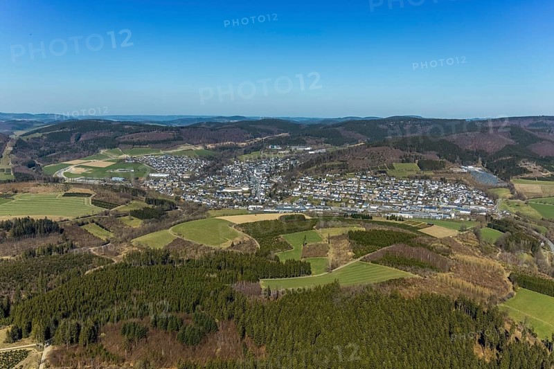 Aerial view, construction site and new construction of the bypass L776n Bad Fredeburg, Fredeburg, Schmallenberg, Sauerland, North Rhine-Westphalia, Germany, construction work, construction, construction area, building site, building plots, construction project, construction site, bridge, DE, relief of the through road, Europe, long-distance view, property tax, real estate, state road L776n, aerial view, aerial photography, aerial photography, new construction, bypass, terraced houses, overview, bypass road, bird's-eye view, forest area, residential area, housing and living, residential area, residential buildings, quality of living, birds-eyes view, overview