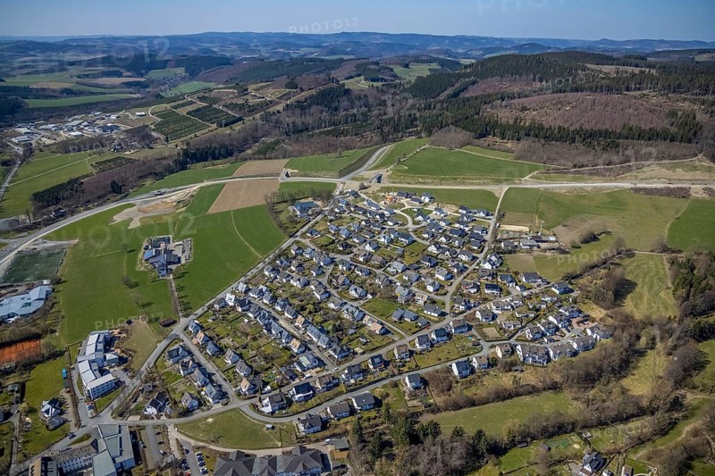 Aerial view, construction site and new construction of the bypass L776n Bad Fredeburg, Fredeburg, Schmallenberg, Sauerland, North Rhine-Westphalia, Germany, construction work, construction, construction area, building site, building plots, construction project, construction site, bridge, DE, relief of the through road, Europe, long-distance view, property tax, real estate, state road L776n, aerial view, aerial photography, aerial photography, new construction, bypass, terraced houses, overview, bypass road, bird's-eye view, forest area, residential area, housing and living, residential area, residential buildings, quality of living, birds-eyes view, overview