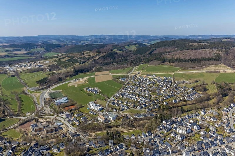 Aerial view, construction site and new construction of the bypass L776n Bad Fredeburg, Fredeburg, Schmallenberg, Sauerland, North Rhine-Westphalia, Germany, construction work, construction, construction area, building site, building plots, construction project, construction site, bridge, DE, relief of the through road, Europe, long-distance view, property tax, real estate, state road L776n, aerial view, aerial photography, aerial photography, new construction, bypass, terraced houses, overview, bypass road, bird's-eye view, forest area, residential area, housing and living, residential area, residential buildings, quality of living, birds-eyes view, overview