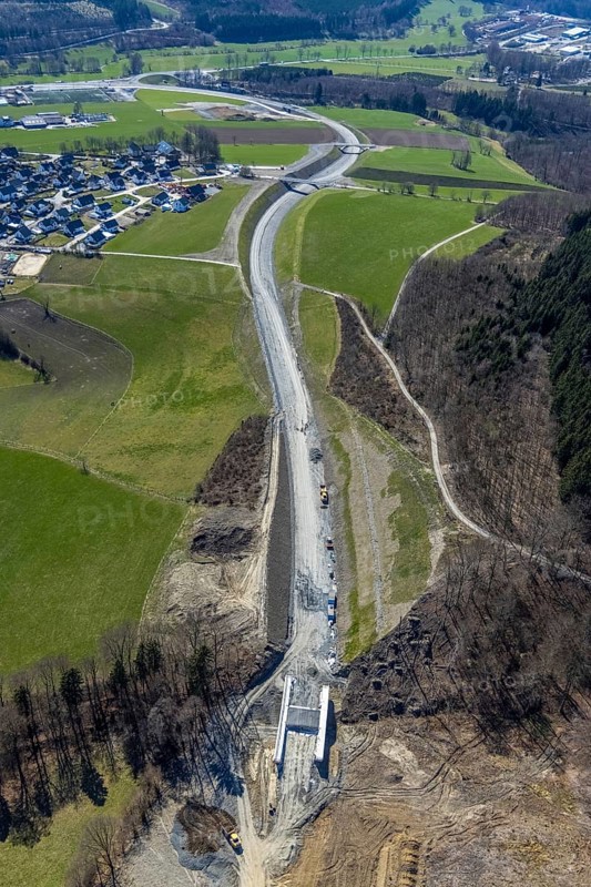 Aerial view, construction site and new construction of the L776n bypass Bad Fredeburg, Fredeburg, Schmallenberg, Sauerland, North Rhine-Westphalia, Germany, construction work, construction, construction area, building site, building plots, construction measure, construction project, construction site, bridge, DE, relief of the through road, Europe, property tax, real estate, state road L776n, aerial view, aerial photography, aerial photography, new construction, bypass, overview, bypass road, bird's eye view, forest area, residential area, housing and living, residential area, residential buildings, quality of living, birds-eyes view, overview