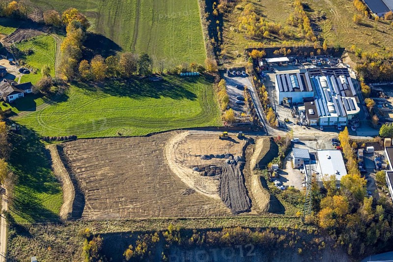 Aerial view, construction area in the industrial estate Zum Hohlen Morgen in the district of Bigge in Olsberg, Sauerland, North Rhine-Westphalia, Germany, construction area, construction site, building plots, DE, Europe, commercial enterprises, commercial area, commercial park, commercial site, commercial use, industrial area, industrial site, aerial photograph, aerial photography, aerial photography, Olsberg, overview, bird's eye view, birds-eyes view, overview