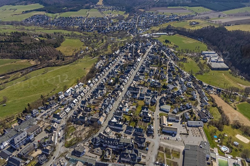 Aerial view, housing estate Weststraße and Oststraße Parallele, St.-Alexander-Kirche, Schützenplatz, Schmallenberg, Sauerland, North Rhine-Westphalia, Germany, place of worship, DE, Europe, religious community, place of worship, property tax, holy place, real estate, church, parish, denomination, aerial photograph, aerial photography, aerial photography, parallel streets, religion, religious site, overview, bird's-eye view, residential area, living and life, residential area, residential buildings, quality of life, residential neighbourhood, housing estate, birds-eyes view, overview