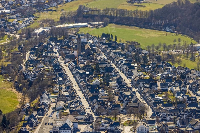 Aerial view, housing estate Weststraße and Oststraße Parallele, St.-Alexander-Kirche, Schützenplatz, Schmallenberg, Sauerland, North Rhine-Westphalia, Germany, place of worship, DE, Europe, religious community, place of worship, property tax, holy place, real estate, church, parish, denomination, aerial photograph, aerial photography, aerial photography, parallel streets, religion, religious site, overview, bird's-eye view, residential area, living and life, residential area, residential buildings, quality of life, residential neighbourhood, housing estate, birds-eyes view, overview